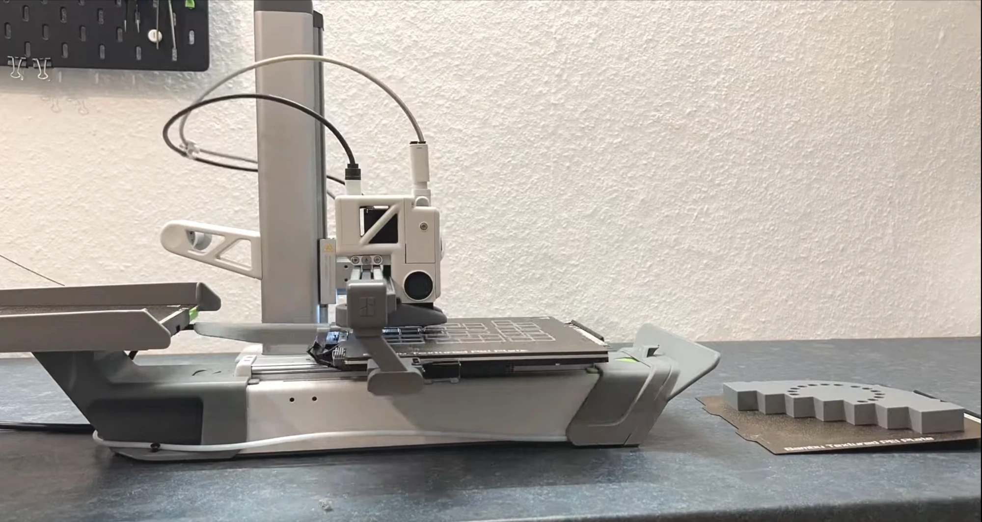 Picture of an A1 Mini printing multiple time the same print with the multi-plate add-on installed